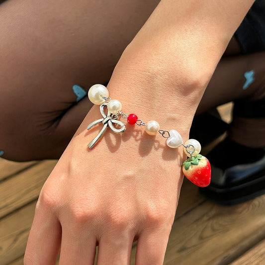 Sweet strawberry bow bracelet Bracelet temperament versatile imitation pearl vacation jewelry - Viral Pulse